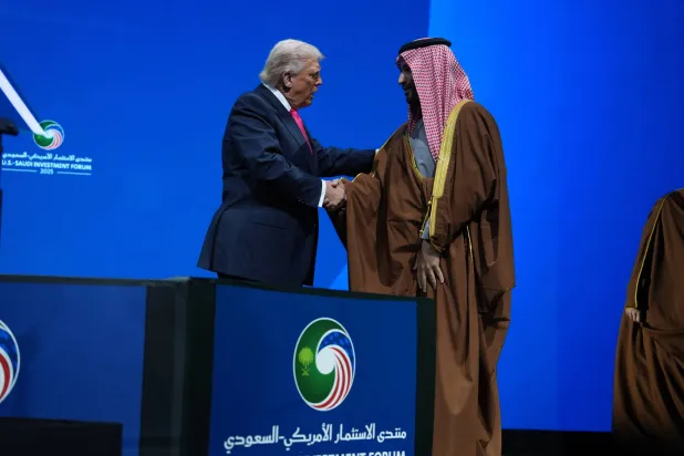 President Donald Trump speaks with Saudi Arabia's Crown Prince Mohammed bin Salman during the Saudi Investment Forum at the Kennedy Center, Wednesday, Nov. 19, 2025, in Washington. (AP Photo/Evan Vucci)