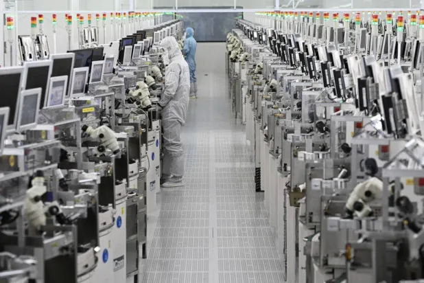 While AI-led demand is surging, chip-makers are also winding back spending on capacity, which is keeping prices elevated. STR / AFP
