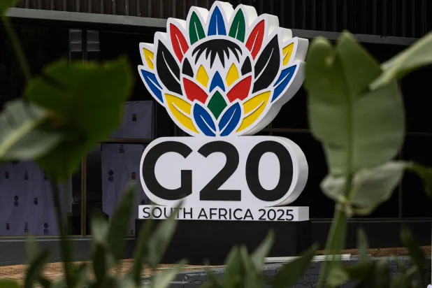A general view of the G20 South Africa 2025 logo ahead of the G20 leaders summit at the Nasrec Expo Center in Johannesburg on November 18, 2025. (Photo by EMMANUEL CROSET / AFP)