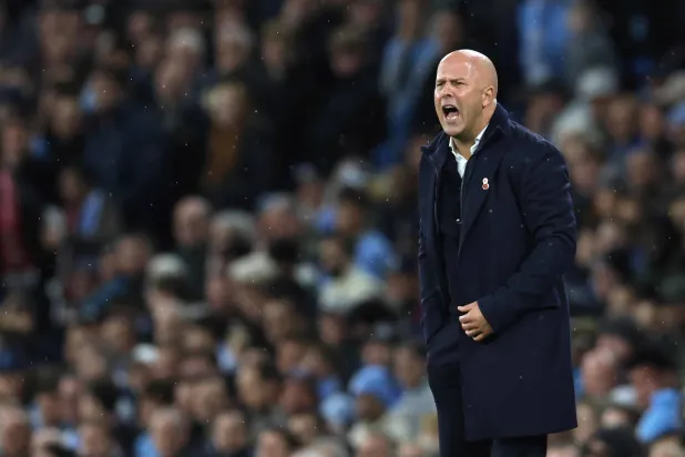 Liverpool's Dutch manager Arne Slot shouts from the touchline during the English Premier League football match between Manchester City and Liverpool at the Etihad Stadium in Manchester, north west England, on November 9, 2025. (Photo by Darren Staples / AFP) 