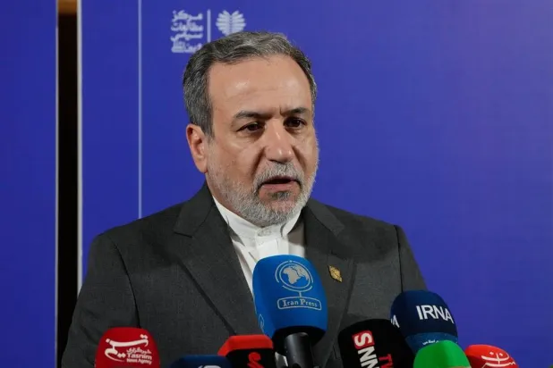Iranian Foreign Minister Abbas Araghchi speaks in a new briefing after attending a conference titled "International Law Under Assault: Aggression and Self-Defense," in Tehran, Iran, Sunday, Nov. 16, 2025. (AP) 