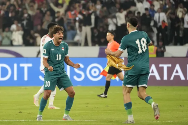 منتخب العراق هزم الإمارات وتأهل للملحق العالمي (إ.ب.أ)