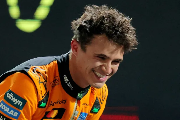 Formula One F1 - Las Vegas Grand Prix - Las Vegas Strip Circuit, Las Vegas, Nevada, United States - November 21, 2025 McLaren's Lando Norris celebrates after qualifying in pole position REUTERS/Daniel Cole