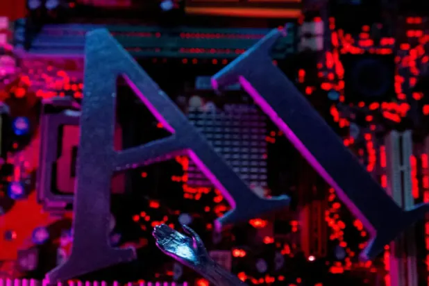 AI (Artificial Intelligence) letters and robot hand are placed on computer motherboard in this illustration created on June 23, 2023. REUTERS/Dado Ruvic/Illustration/File Photo
