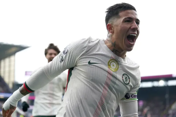 Chelsea's Enzo Fernandez celebrates scoring their side's second goal during the English Premier League soccer match between Burnley v Chelsea, in Burnley, England, Saturday Nov. 22, 2025. (Martin Rickett/PA via AP)