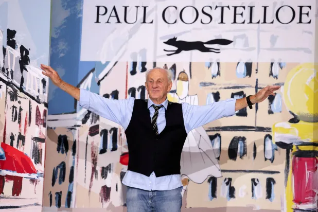 FILE PHOTO: Fashion designer Paul Costelloe appears onstage during the presentation of his creations at the Paul Costelloe catwalk show during London Fashion Week in London, Britain, September 13, 2024. REUTERS/Hollie Adams/File Photo