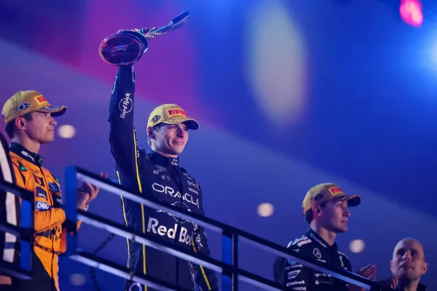  Race winner Max Verstappen of the Netherlands and Oracle Red Bull Racing lifts his trophy on the podium during the F1 Grand Prix of Las Vegas at Las Vegas Strip Circuit on November 22, 2025 in Las Vegas, Nevada. (Getty Images via AFP) 
