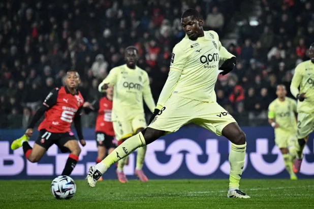 Monaco’s French midfielder #08 Paul Pogba kicks the ball during the French L1 football match between Stade Rennais FC and AS Monaco at the Roazhon Park stadium in Rennes, western France, on November 22, 2025. (AFP) 