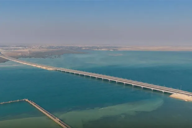 The 15-km marine bridge linking Safwa in Qatif Governorate with Ras Tanura (Saudi Projects). 