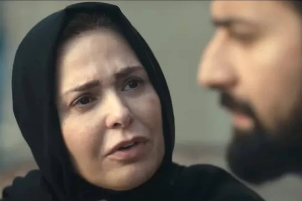 صابرين وأحمد حاتم في مشهد من «الملحد» (الشركة المنتجة)