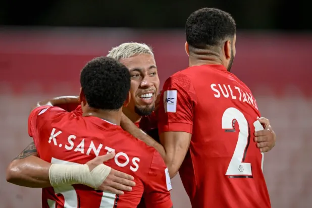 فرحة لاعبي شباب الأهلي بالفوز على الغرافة (الاتحاد الآسيوي)