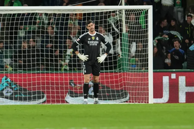 Real Madrid's goalkeeper Thibaut Courtois reacts after Elche's Alvaro Rodrigue scored his side's second goal during the Spanish La Liga soccer match between Elche and Real Madrid in Elche, Spain, Sunday, Nov. 23, 2025. (AP)