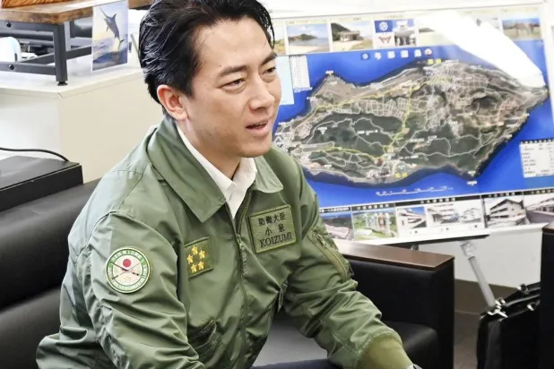 Japan's Defense Minister Shinjiro Koizumi meets with Yonaguni town mayor Tsuneo Uechi (not in picture) at Yonaguni town hall, on Yonaguni island, Japan's westernmost inhabited island in Okinawa prefecture, Japan November 23, 2025, in this photo taken by Kyodo. (Kyodo/via Reuters) 