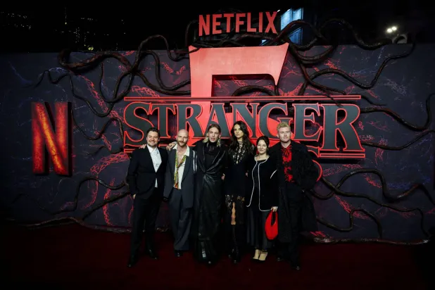 Cast member Jamie Campbell Bower and guests attend the screening for the final season of the television series "Stranger Things", at Odeon Luxe Leicester Square in London, Britain, November 13, 2025. REUTERS/Isabel Infantes