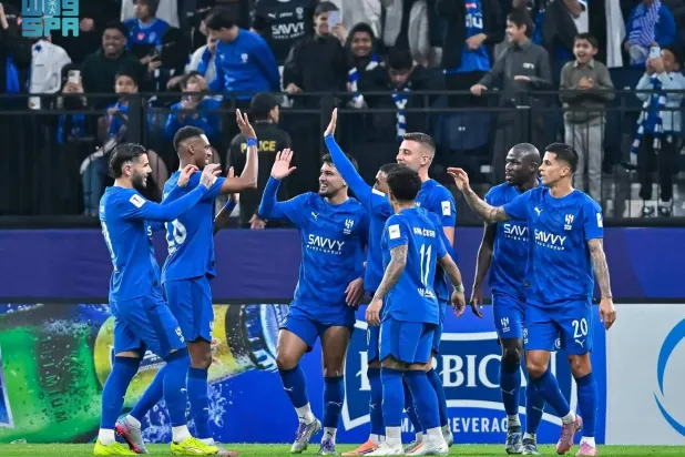 Al-Hilal players celebrate a goal scored during Tuesday's match. (SPA)