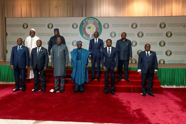 Senegal President Macky Sall, Ivory Coast President Alassane Ouattara, President of Economic Community of West African States Commission Omar Touray, Nigerian President Bola Ahmed Tinubu, Togo's President Faure Gnassingbe, Ghana President Nana Akufo-Addo, Vice President of Gambia Muhammad B.S Jallow, Sierra Leone President Julius Maid Bio, Benin Republic President Patrice Talon and Guinea-Bissau President Umaro Sissoco Embalo during the Economic Community of West African States (ECOWAS) Extraordinary Session of the Authority of Heads of State and Government on the political, Peace and Security Situation in the ECOWAS sub-region in Abuja, Nigeria February 24, 2024. REUTERS/Marvellous Durowaiye  NO RESALES. NO ARCHIVES