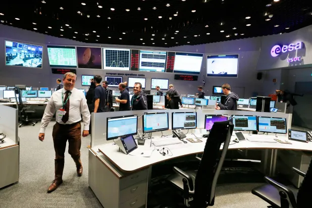 FILE- A view of the control room at the European Space Agency in Darmstadt, Germany, on Sept. 30, 2016.(AP Photo/Michael Probst, File)