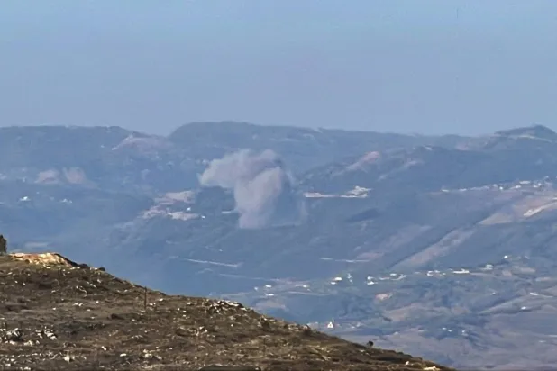 Smoke rises following an Israeli airstrike on southern Lebanon, as seen from the Israeli side of the Israel-Lebanon border, in northern Israel, November 27, 2025. REUTERS/Avi Ohayon
