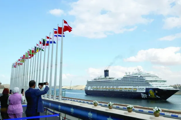 A vessel passes through the Suez Canal, Egypt, November 25, 2025. REUTERS/Mohamed Abd El Ghany      