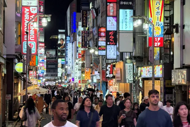FILE PHOTO: People walk at a shopping area of Shinjuku in Tokyo, Japan, September 11, 2025. REUTERS/Fabrizio Bensch/File Photo/File Photo