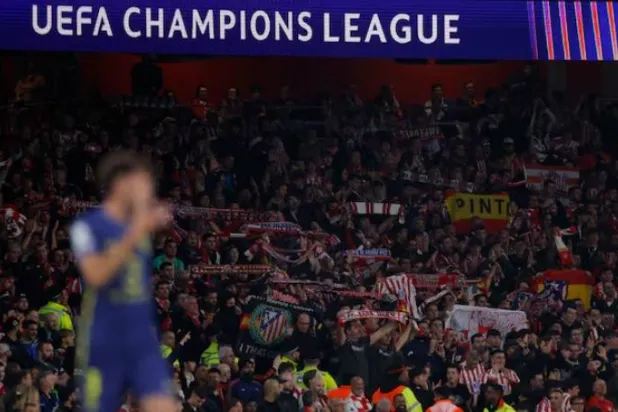 Soccer Football - UEFA Champions League - Arsenal v Atletico Madrid - Emirates Stadium, London, Britain - October 21, 2025 Atletico Madrid fans hold up scarves Action Images via Reuters/Andrew Couldridge