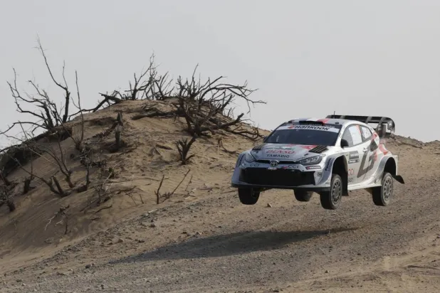 French driver Sebastien Ogier and his co-driver Vincent Landais compete in their Toyota GR Yaris during stage 5 of the FIA World Rally Championship (WRC) in Jeddah. Fayez Nureldine / AFP
