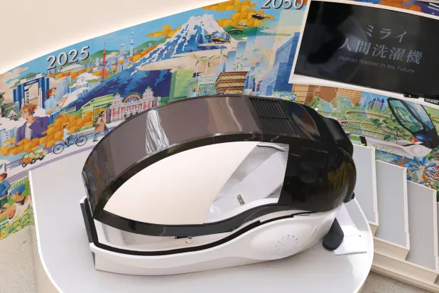 This photo taken on April 9, 2025 shows the Mirai Human Washing Machine, which attracted attention at the Osaka Expo. (Photo by JIJI Press / AFP) / Japan OUT