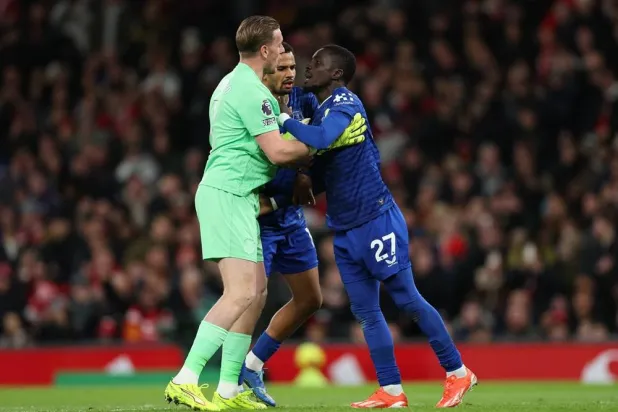 Idrissa Gueye of Everton (R) grabs Jordan Pickford of Everton (L) as Iliman Ndiaye of Everton (C) tries to intervene during the English Premier League match between Manchester United and Everton FC in Manchester, Britain, 24 November 2025. (EPA) 