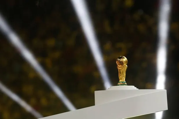 Football - FIFA World Cup Qatar 2022 - Final - Argentina v France - Lusail Stadium, Lusail, Qatar - December 18, 2022 General view of the World Cup trophy on a plinth before the trophy presentation. (Reuters)