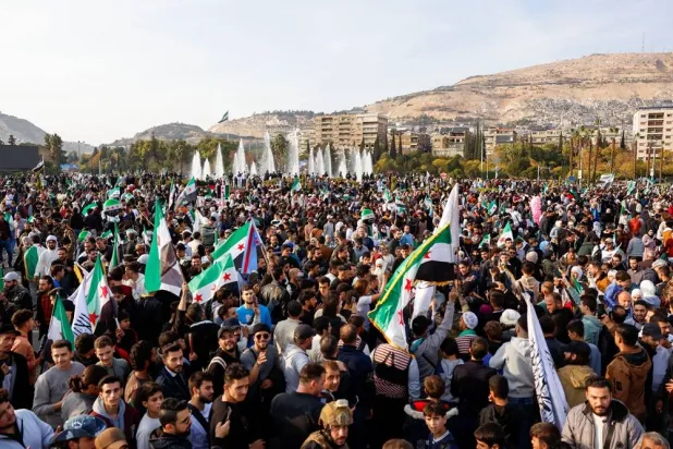  People attend a protest in support of Syrian territorial unity and against division, in Damascus, Syria, November 28, 2025. (Reuters)