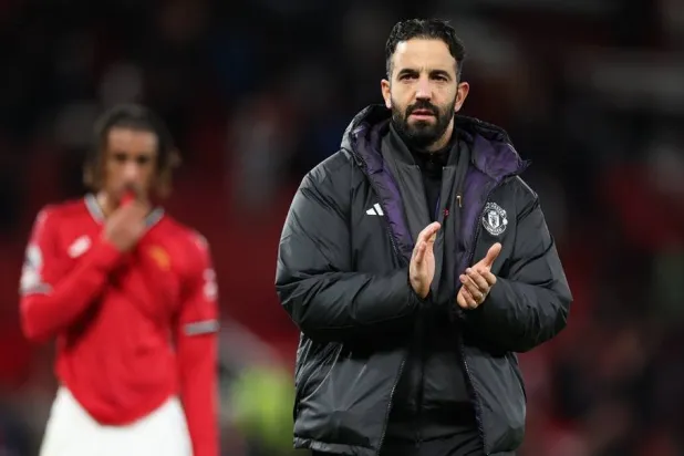 Leny Yoro of Manchester United (L) and Manchester United manager Ruben Amorim reacts after the English Premier League match between Manchester United and Everton FC in Manchester, Britain, 24 November 2025. (EPA) 