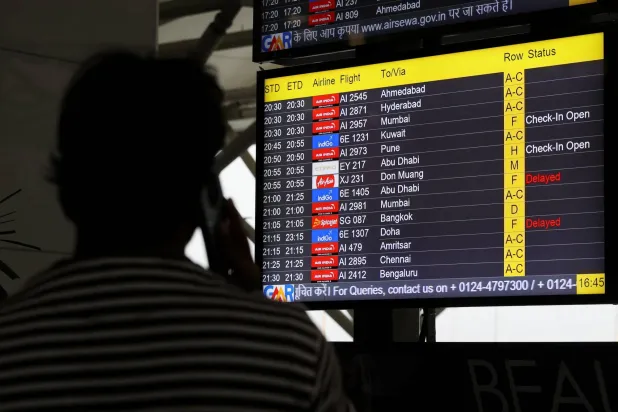  A screen displays delays in IndiGo flights at the Indira Gandhi International Airport in Delhi, India, November 29, 2025. (Reuters)
