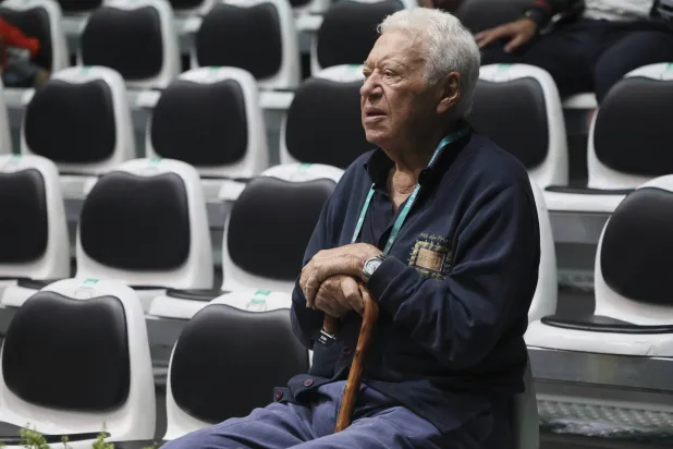 Former Italian tennis legend and Davis Cup winner Nicola Pietrangeli sits during the tennis Davis Cup final 8 match between Brazil's Joao Fonseca and Netherland's Botic Van De Zandschulp at the Unipol arena, in Bologna, northern Italy, Thursday, September 12, 2024. (Michele Nucci/LaPresse via AP)