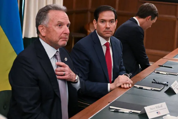 US Secretary of State Marco Rubio (C), alongside White House Special Envoy Steve Witkoff (L) and Jared Kushner (R), attend a meeting with Ukrainian officials headed by Rustem Umerov in Hallandale Beach, Florida on November 30, 2025. (Photo by CHANDAN KHANNA / AFP)