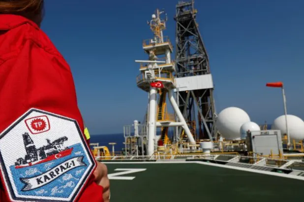 A Turkish Petroleum (TPAO) engineer poses on the helipad of Turkish drilling vessel Yavuz in the eastern Mediterranean Sea off Cyprus, August 6, 2019. Picture taken August 6, 2019. REUTERS/Murad Sezer