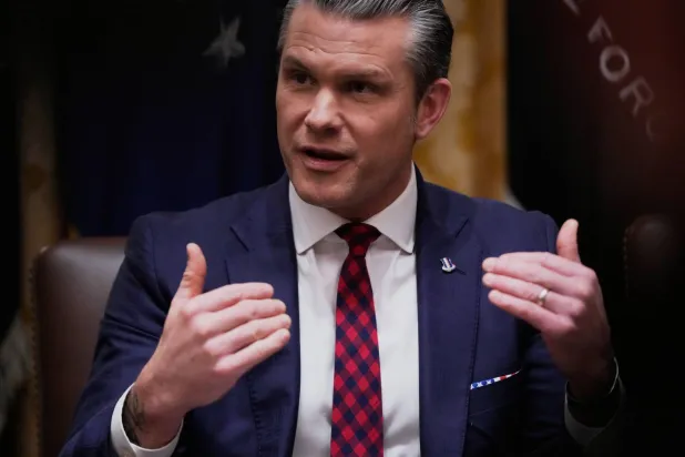 Defense Secretary Pete Hegseth speaks during a Cabinet meeting at the White House, Tuesday, Dec. 2, 2025, in Washington. (AP Photo/Julia Demaree Nikhinson)