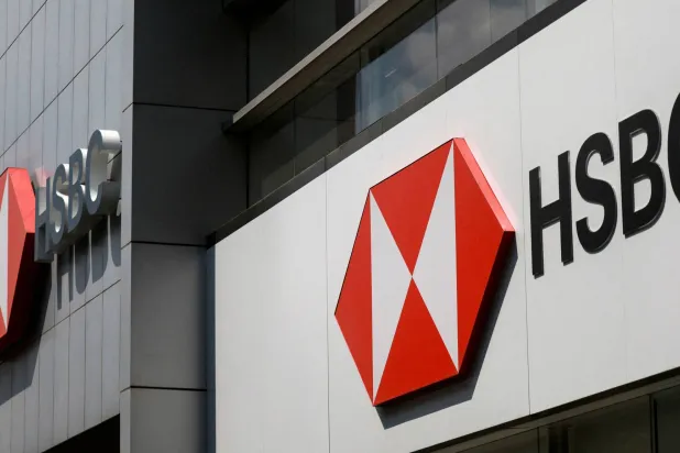 FILE PHOTO: Two HSBC bank logos are displayed on an office building in Mexico City, Mexico, July 25, 2025. REUTERS/Henry Romero/File Photo/File Photo