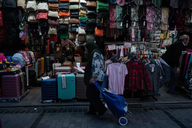 A customer shops at a stall in a bazaar in Istanbul on September 6, 2022. (AFP) 