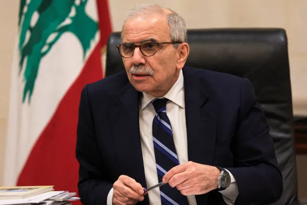  Lebanese Prime Minister Nawaf Salam speaks to journalists at the government headquarters in Beirut, Lebanon, December 3, 2025. (Reuters)