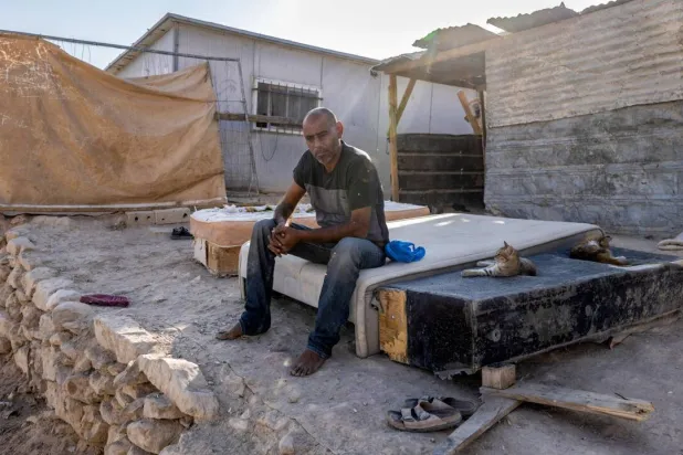AFP visited Ahmed Kaabneh weeks before he was forced to flee his home in the al-Hathrura area. Menahem Kahana / AFP
