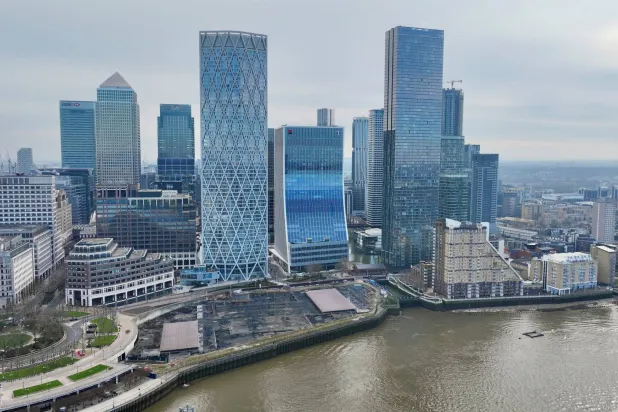 FILE PHOTO: A drone view of London's Canary Wharf financial district, two days before the government presents its critical pre-election budget, in London, Britain March 3, 2024. REUTERS/Yann Tessier/File Photo