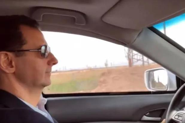 بشار الأسد يقود سيارته في الغوطة الشرقية في 2018 (أرشيفية - متداول)