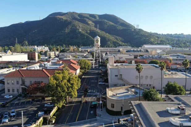 An aerial view of the Warner Bros. logo displayed on the water tower at Warner Bros. Studio on December 5, 2025 in Burbank, California. (Getty Images/AFP)
