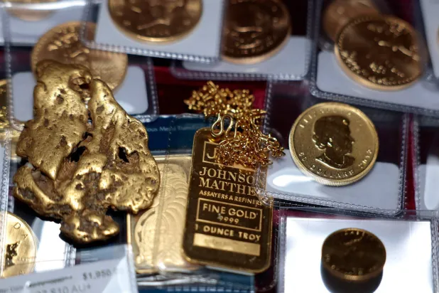 A one-ounce gold bar is displayed at Witter Coins on October 07 2025 in San Francisco. (AFP)