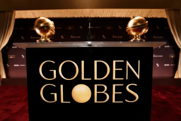 A podium stands near Golden Globe statues, ahead of the announcement of the nominations for the 83rd Golden Globe Awards in Beverly Hills, California, US, December 8, 2025. REUTERS/Mario Anzuoni 