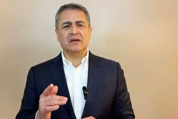 الرئيس السابق خوان أورلاندو هيرنانديز (رويترز)