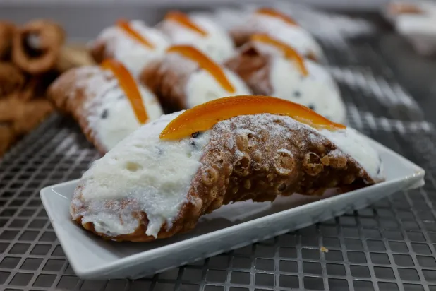 Sicilian cannoli are served at Pasticceria Cappello as Italian cuisine awaits a crucial UNESCO decision that could recognize it as an Intangible Cultural Heritage of Humanity in Palermo, Italy, December 5, 2025. (Reuters)