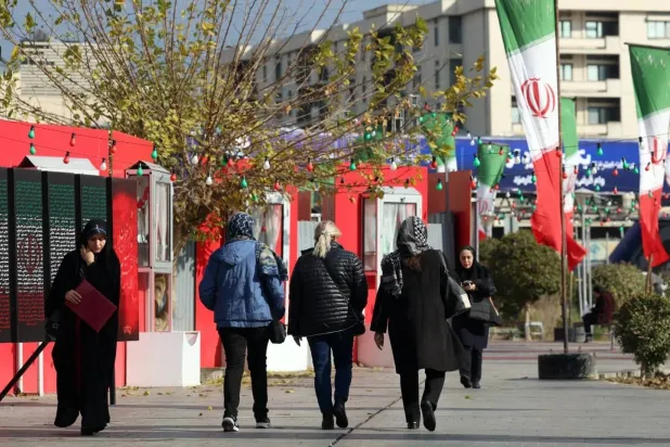Iranian flags in central Tehran on Wednesday (EPA)