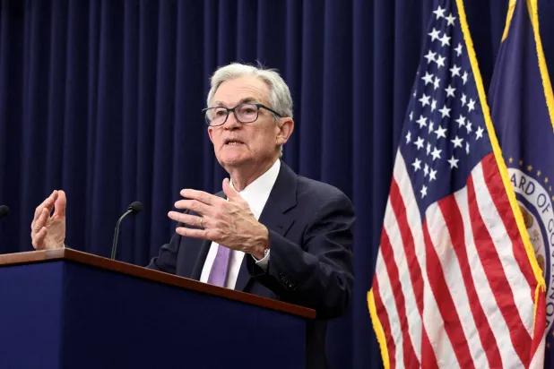 FILE PHOTO: US Federal Reserve Chair Jerome Powell holds a press conference in Washington, D.C., US, October 29, 2025. REUTERS/Kevin Lamarque/File Photo