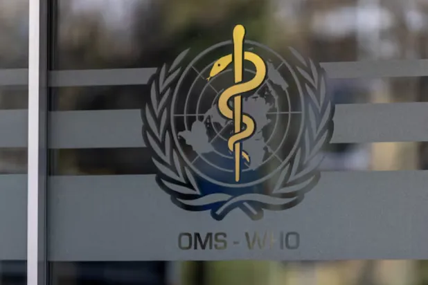 The logo of the World Health Organization is seen at the WHO headquarters in Geneva, Switzerland, January 28, 2025. REUTERS/Denis Balibouse/File Photo 